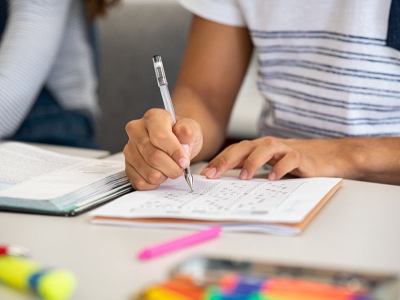 Child using pen and paper